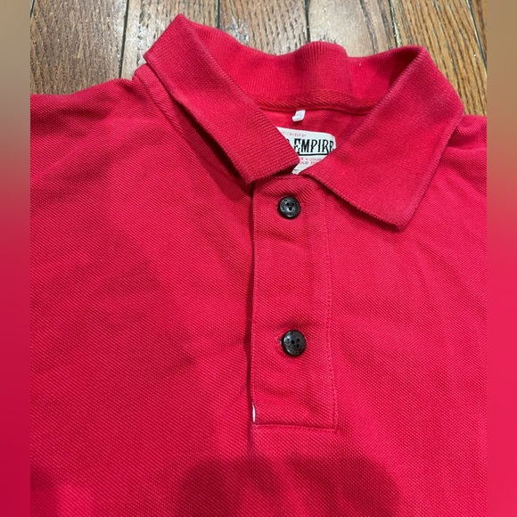 AKKO EMPIRE
Stylish Red Polo Shirt with Fox Design - Picture 2 of 10